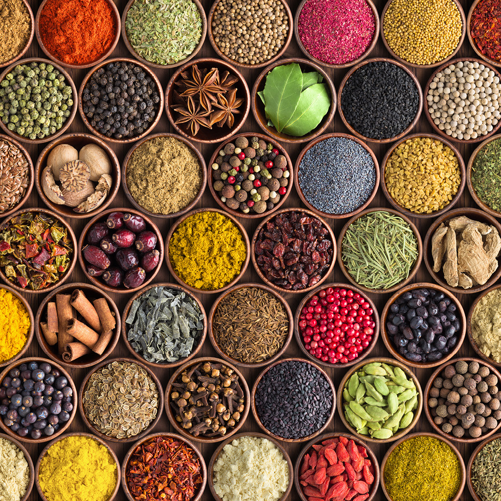 A picture if several small bowls of spices.