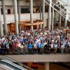 Group shot of the 50+ members of the Diplomas Now team in the conference center.