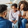 Family being interviewed by an education professional