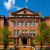 The Johns Hopkins School of Education brick building main entrance.