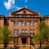 The Johns Hopkins School of Education brick building main entrance.