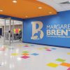 A hallway with "Margaret Brent Elementary/Middle School" painted on the wall.