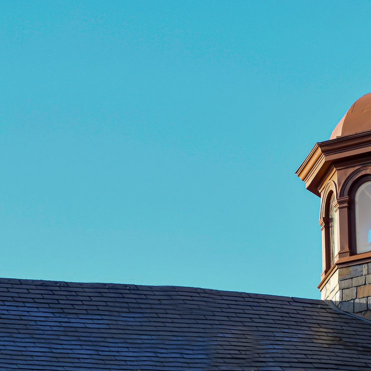 The top of a building on the Johns Hopkins University Homewood campus.