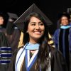 Neha Amir in graduation regalia.